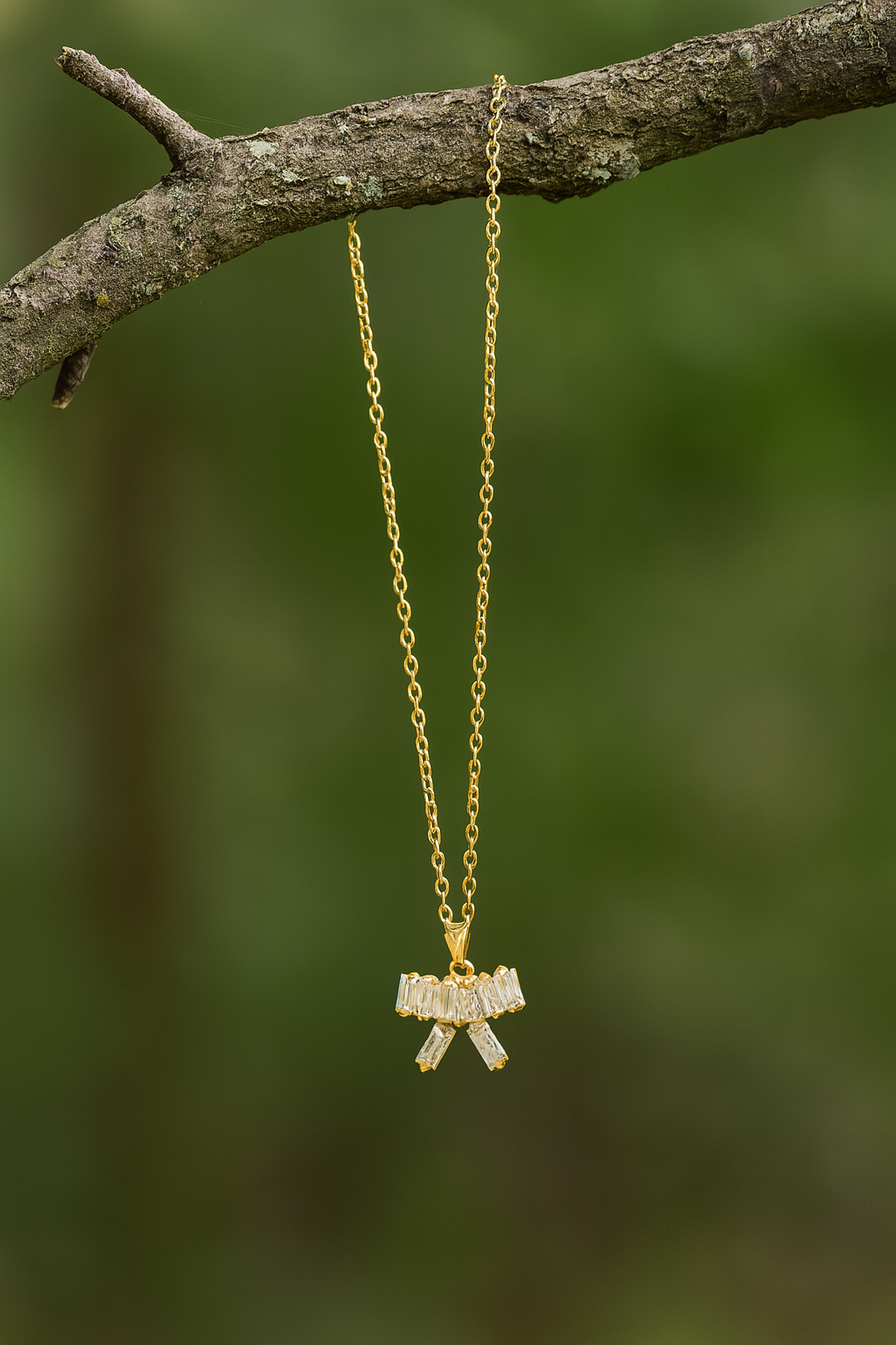 Gleam Bow Pendant Necklace